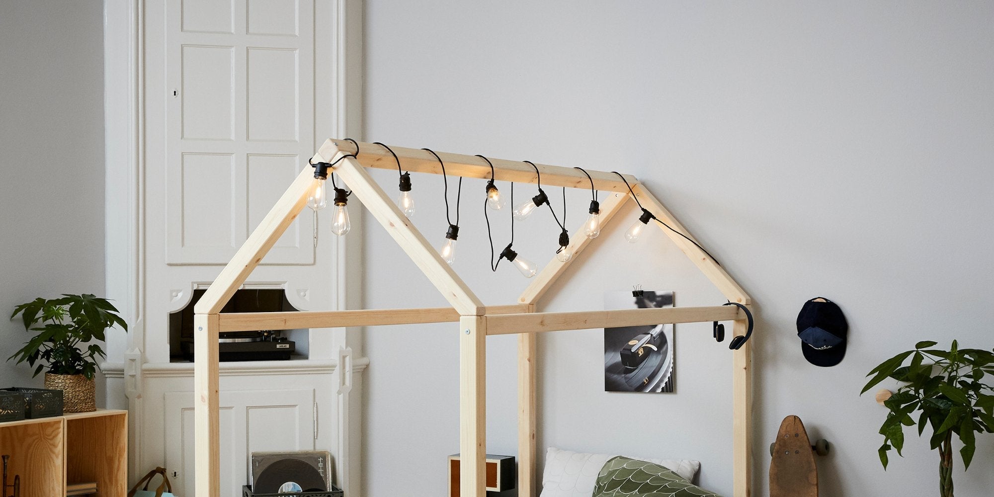 Girl playing in her room with a house bed from FLEXA