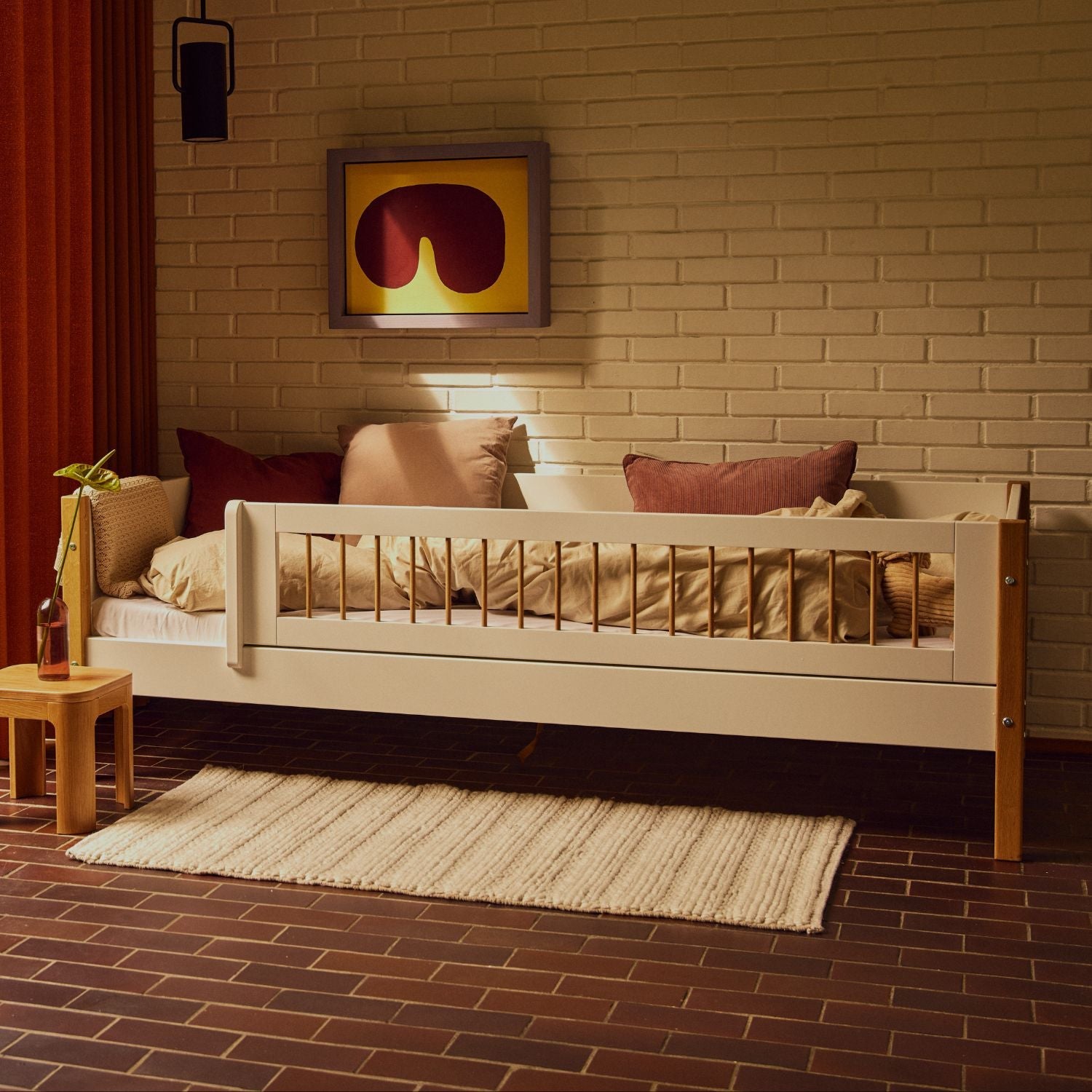 Boy reading in his Nor single bed from FLEXA