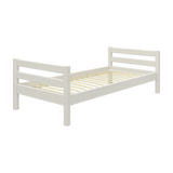 FLEXA single bed from WHITE collection, white wood frame with headboard, child-safe rounded edges, in child’s bedroom.