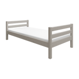 FLEXA bed from CLASSIC collection, grey wood, slatted headboard, child-safe corners, shown in a child’s bedroom.