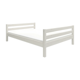 FLEXA white single bed, 140x200 cm, with horizontal slatted headboard and footboard, on plain backdrop.