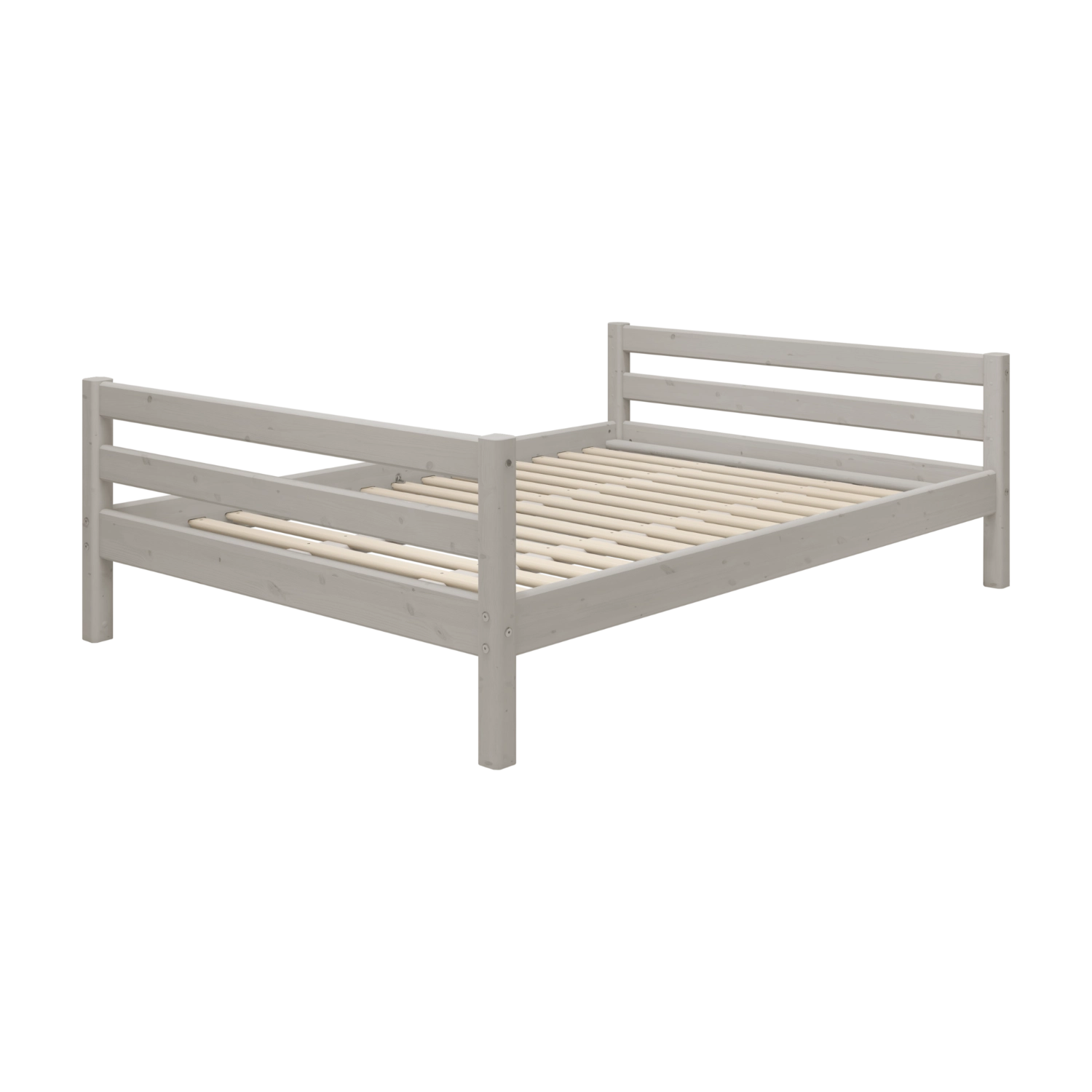 Cama individual FLEXA CLASSIC de pino gris con somier de listones, cabecero y piecero en una habitación infantil.