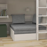 FLEXA WHITE high bed from CLASSIC with desk, sofa, ladder, guard rail, shelves, lamp and green storage in a child’s room.