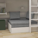 FLEXA WHITE high bed from CLASSIC with desk, sofa, ladder, guard rail, shelves, lamp and green storage in a child’s room.
