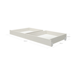 Cajones con ruedas para debajo de la cama de pino blanco de la marca FLEXA, que se muestran en una habitación infantil; con bordes redondeados para mayor seguridad.