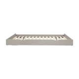 FLEXA pull-out bed from CLASSIC collection in grey, horizontal slats, child-safe design, shown front on plain background.