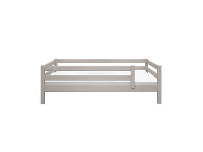 Single bed with safety rail