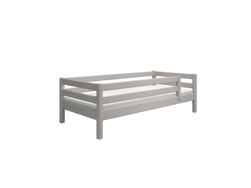 Single bed with safety rail