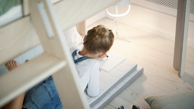 Mid-high bed with slanting ladder